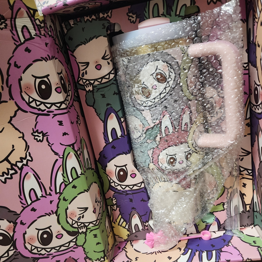 Stanley Pink and Multicolor Thermos